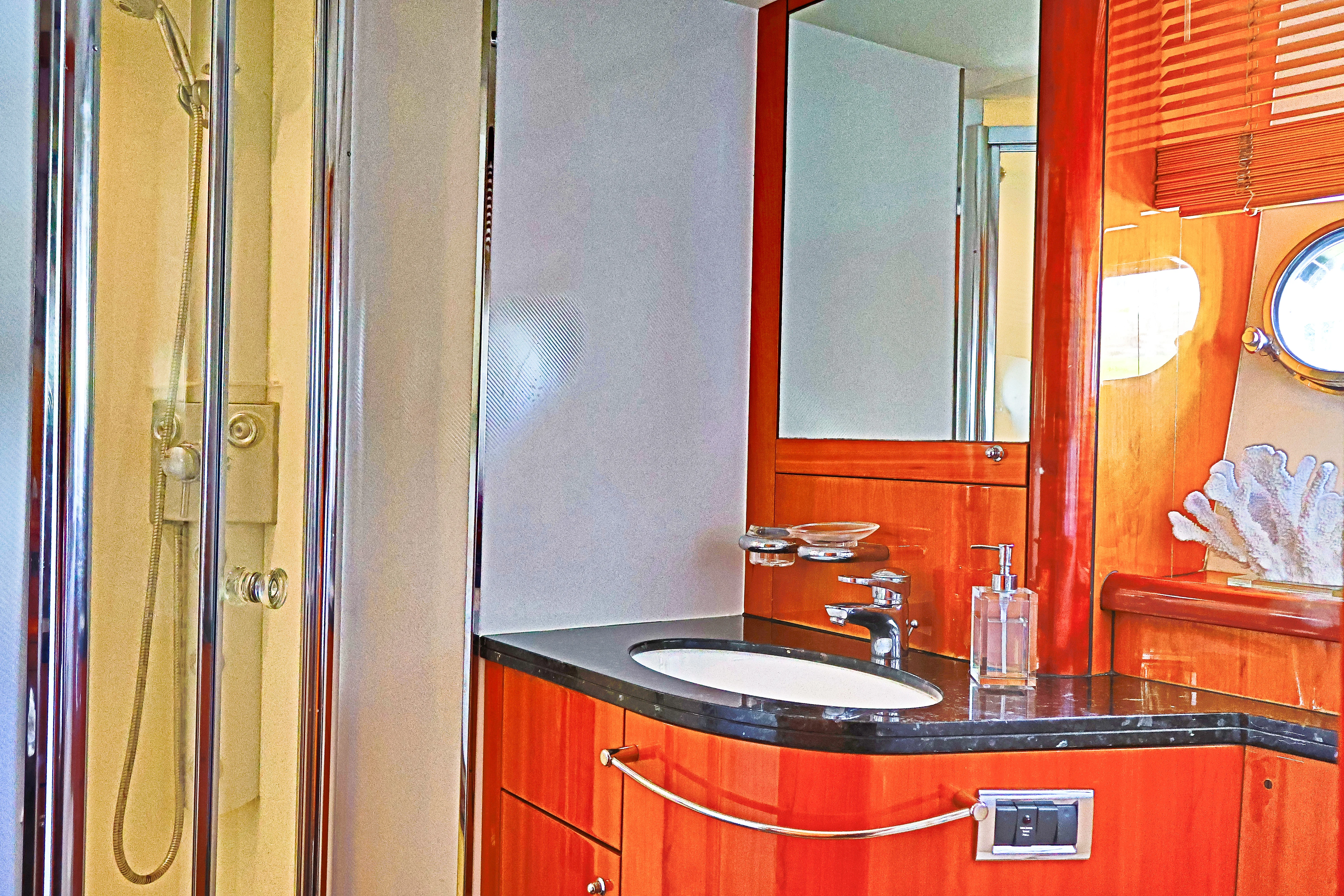 90ft Sunseeker Deep Blue twin cabin bathroom